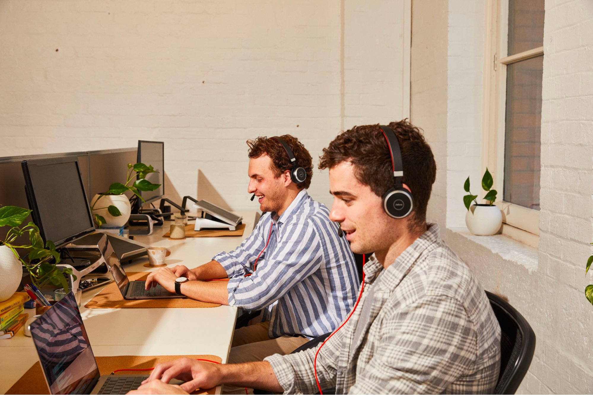 two employees working in the office