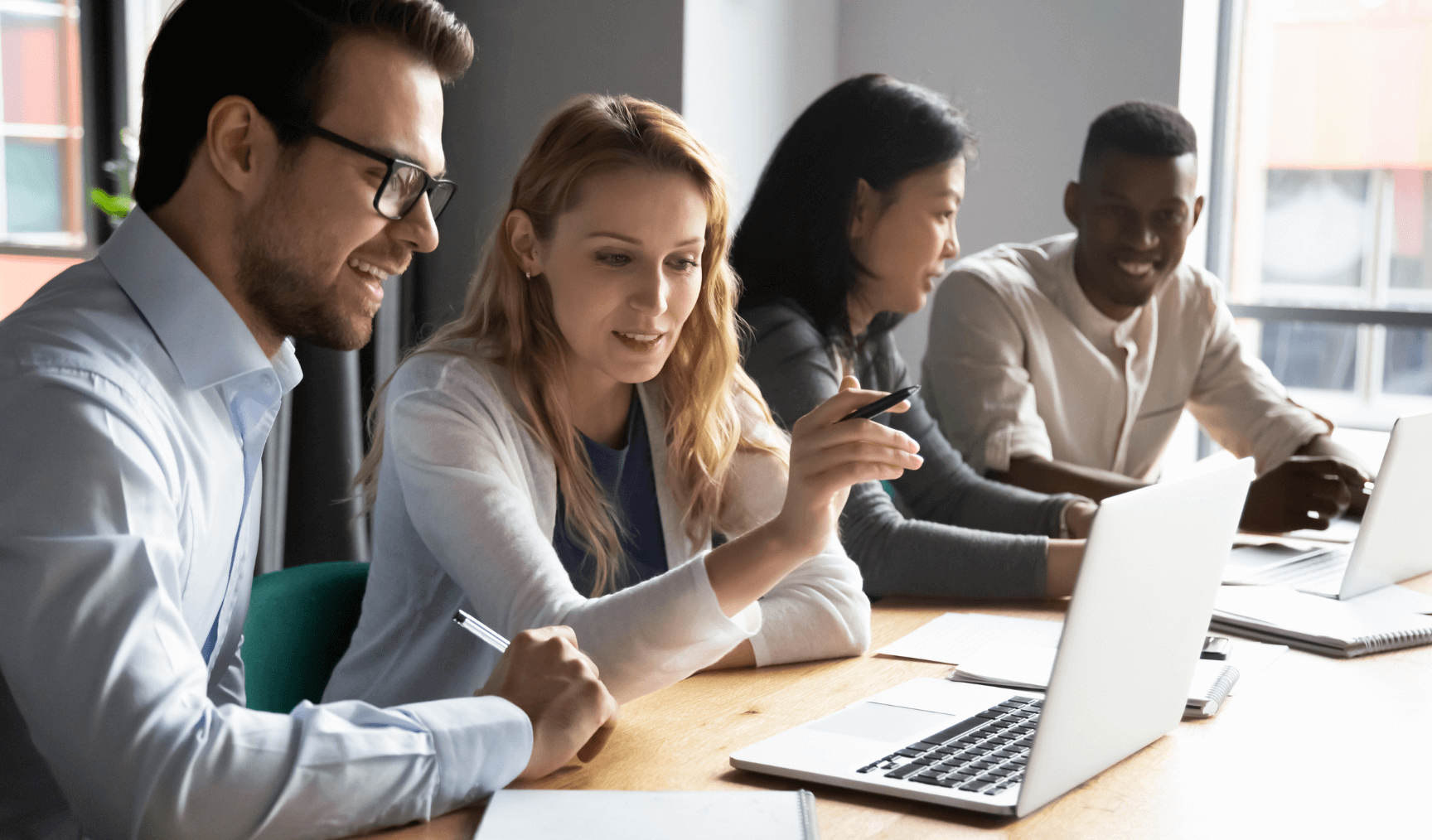 a group of employees having a discussion