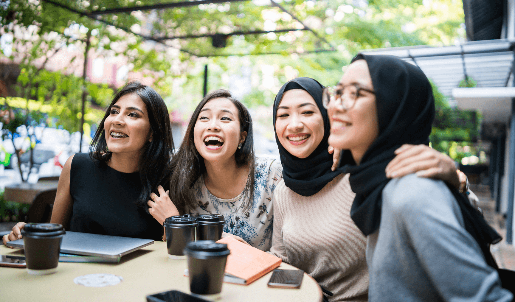 a group of women working together and smiling