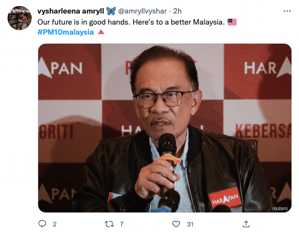 Anwar Ibrahim speaking into the microphone to the press