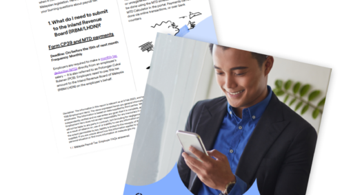 man smiling at his phone while in the office