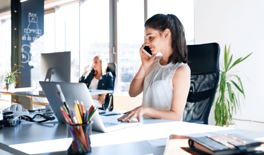 woman talking on the phone in the office