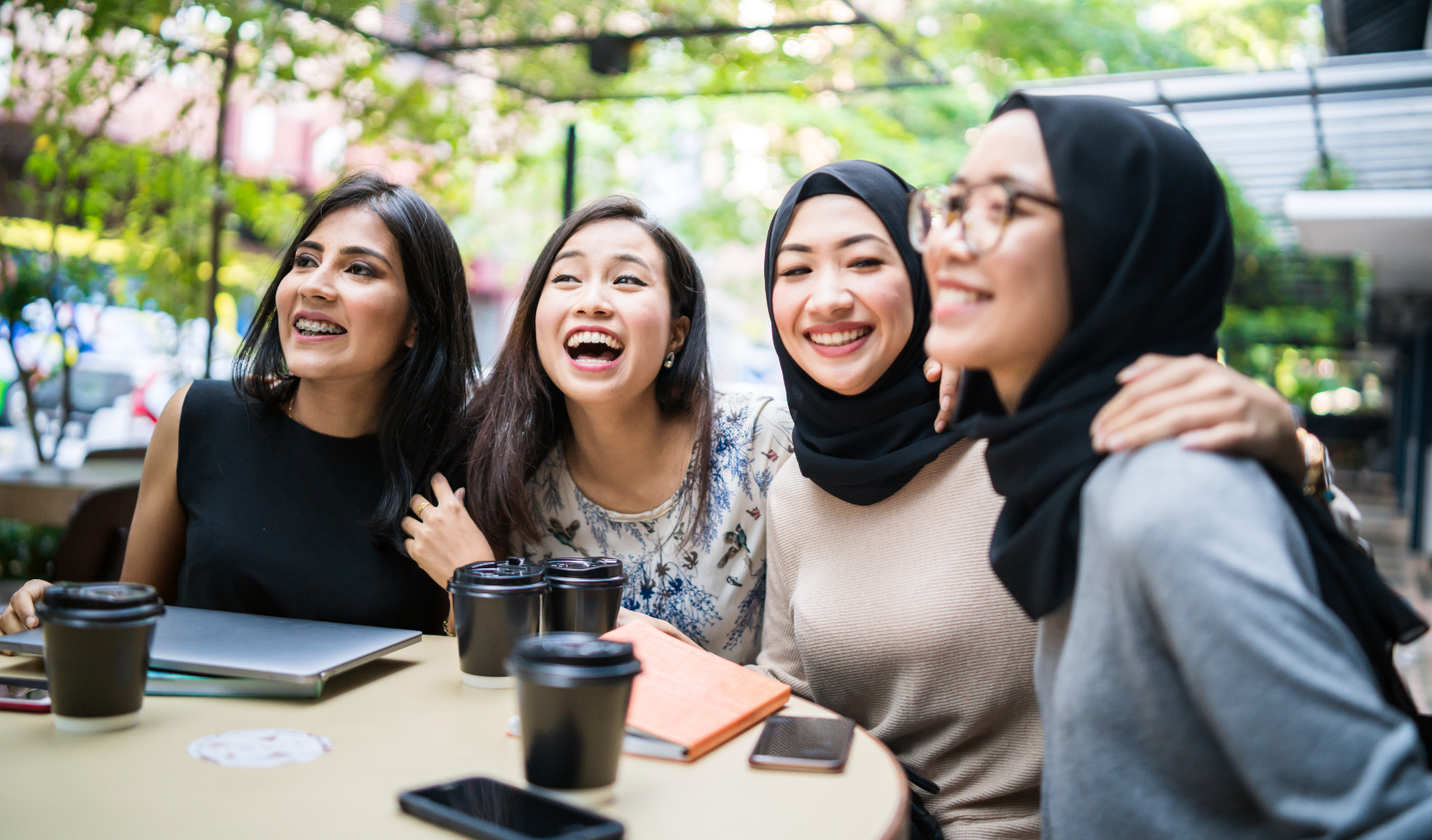 employees having a great time chatting together at lunch