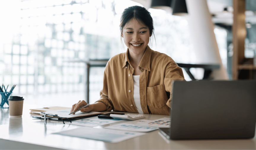 image of a woman sitting at her desk - Future Proof Your Accounting Practice Strategies for Success