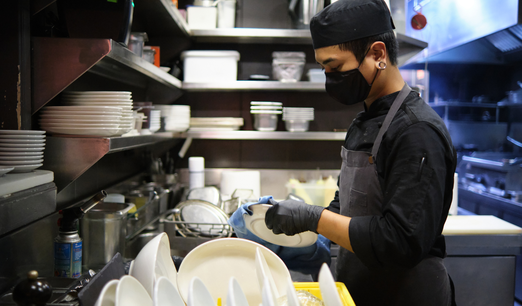 shift worker washing the dishes