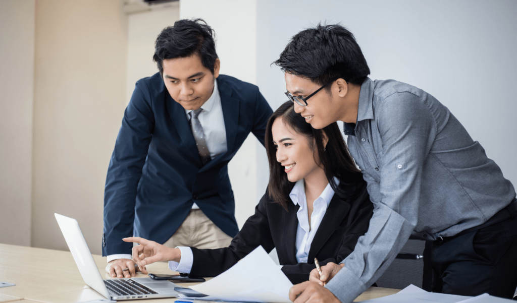 a group of colleagues working together at the office