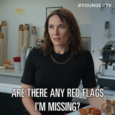 GIF of a woman saying 'are there any red flags I'm missing?'