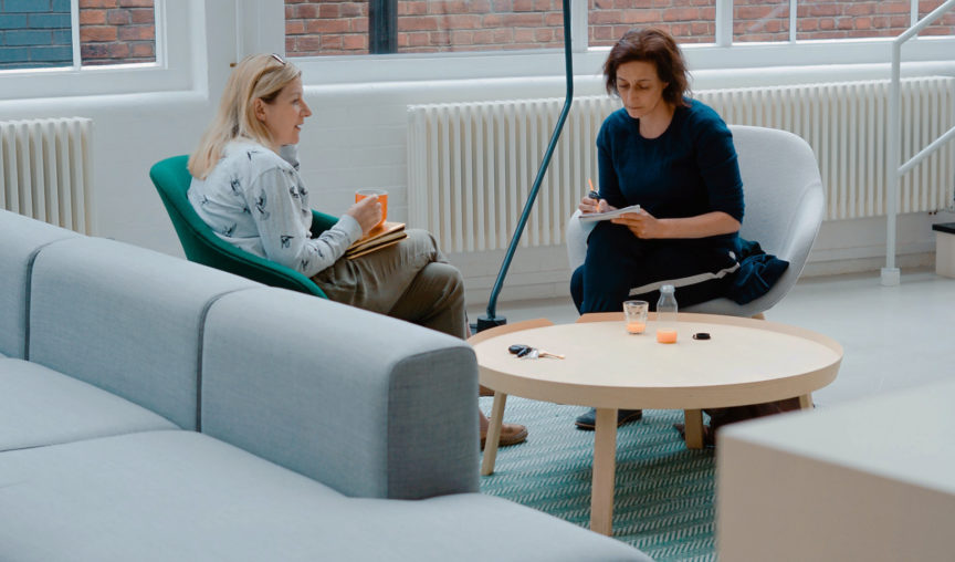 naviagting compensation conversations - two women sitting at a table talking