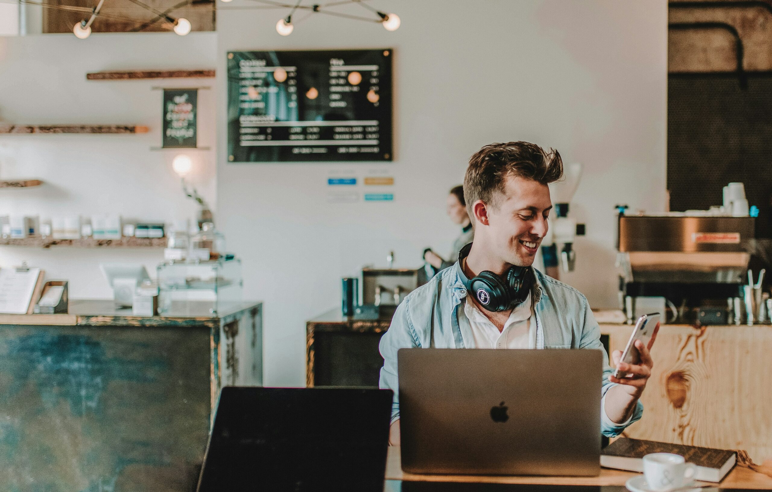 man working at a coffee shop