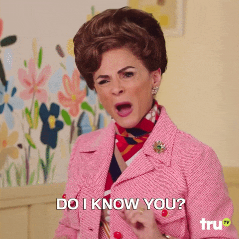 Gif of woman in pink suit jacket, text reads "Do I know you?"