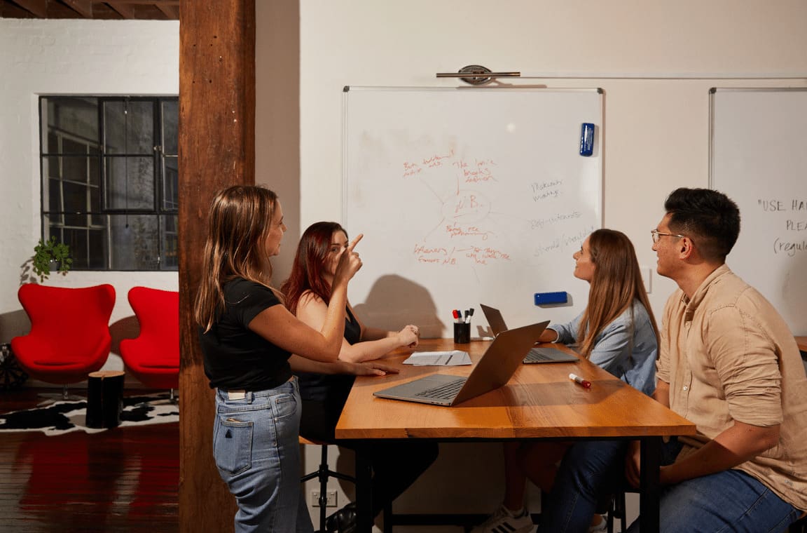 a group of colleagues having a discussion