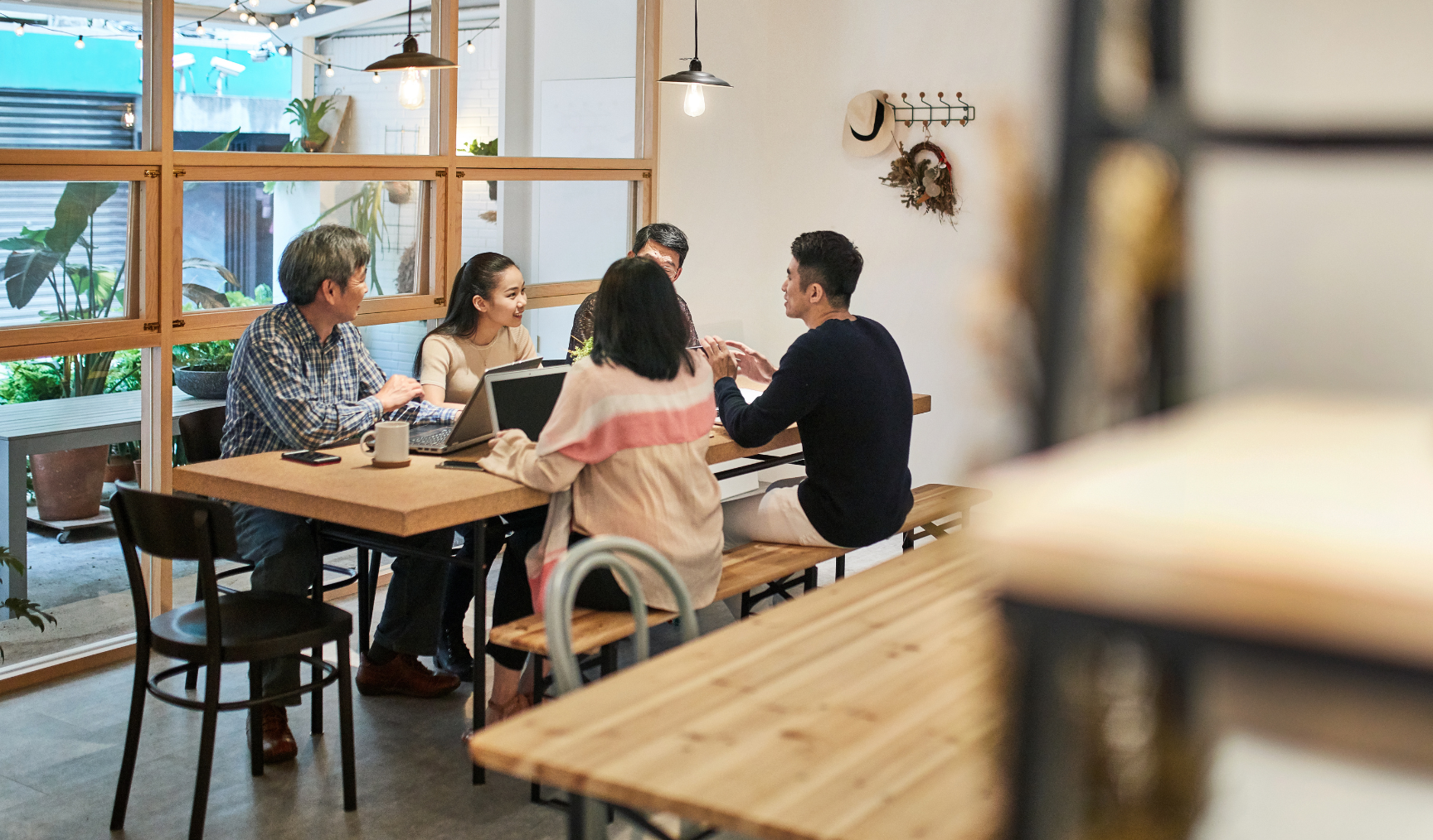 group of colleagues chatting in the office