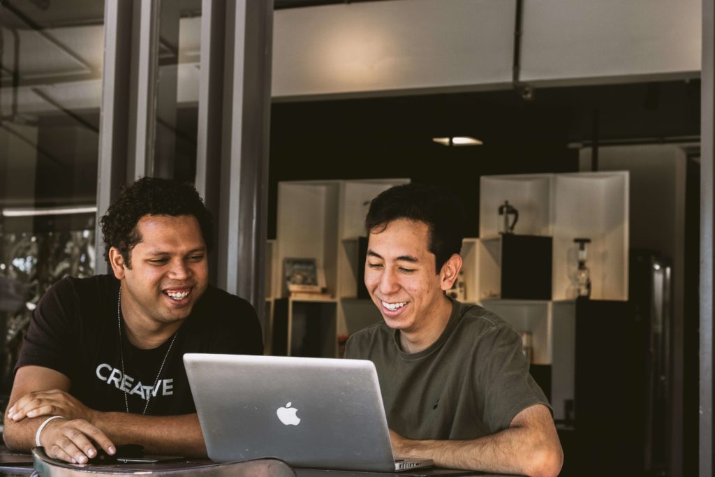 employees going through hr and payroll software 