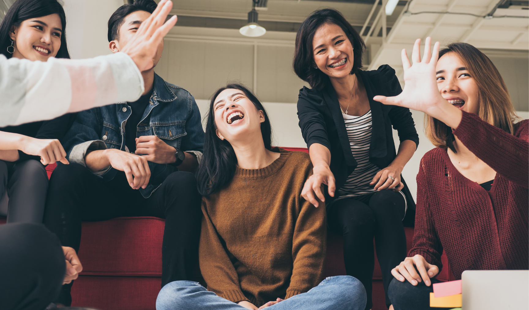 bunch of colleagues having fun and laughing
