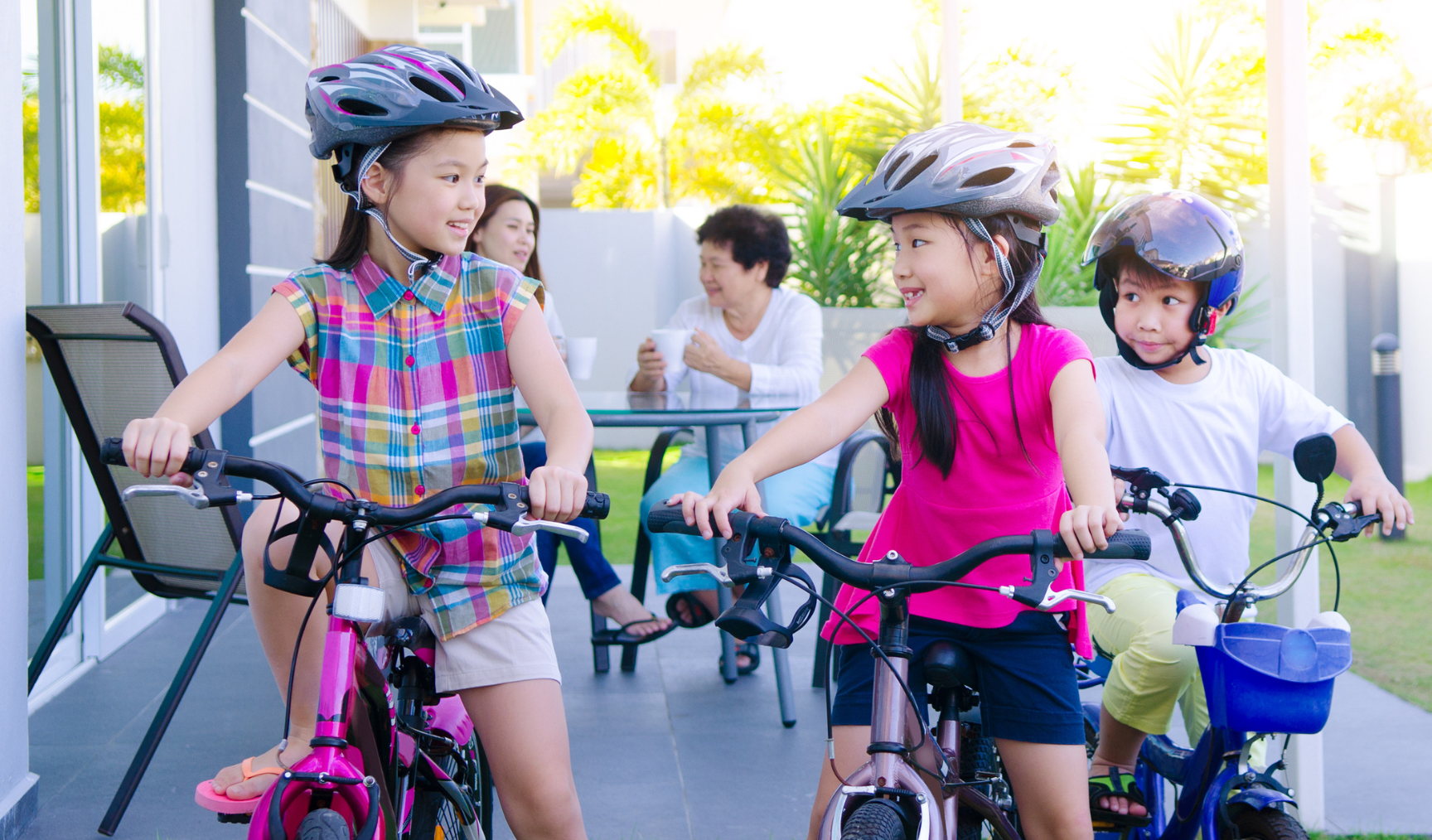 bunch of kids riding on their bikes