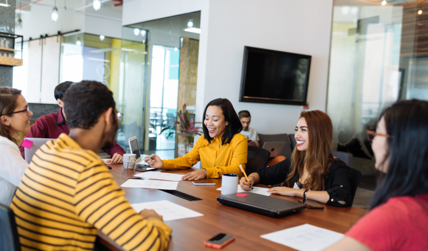employees having a lively discussion in the meeting room