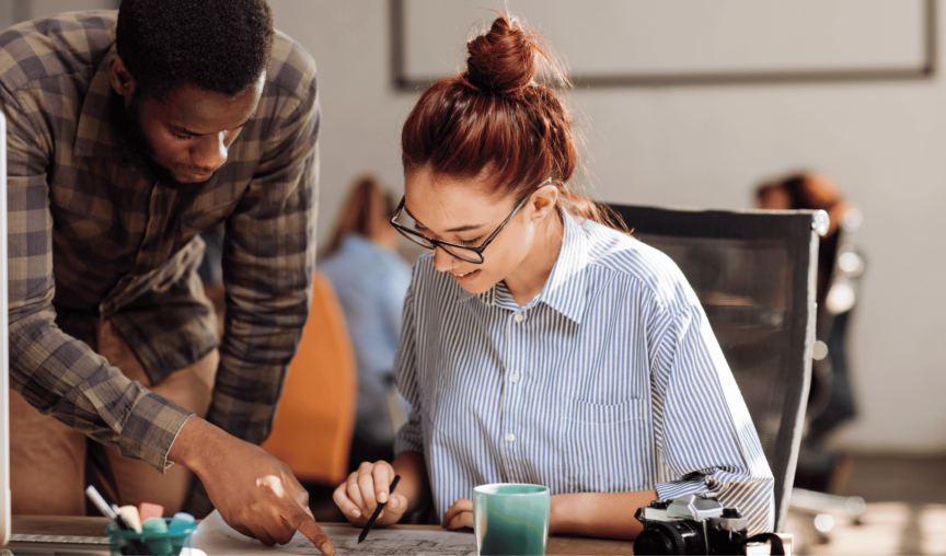 This is an image of 2 people working together.