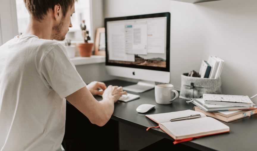 Man working remotely on his computer.