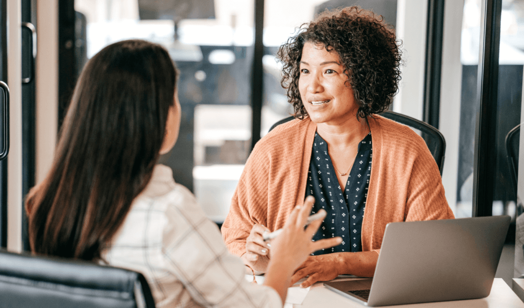 two women having a work discussion