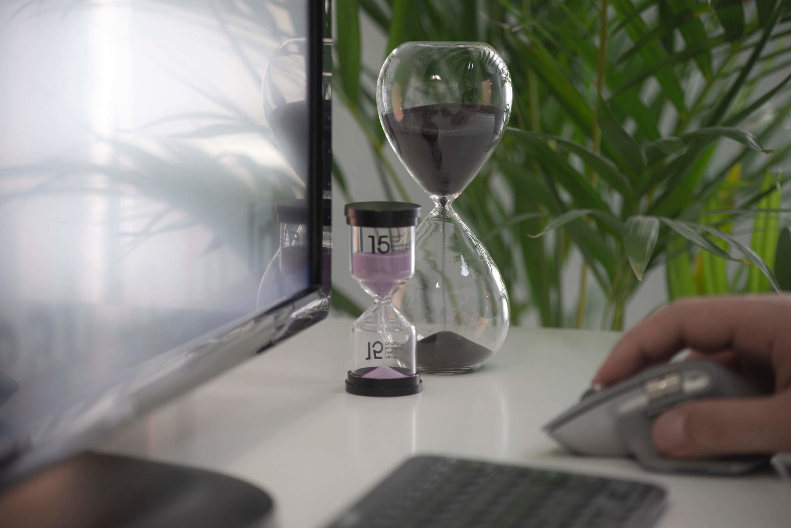 two egg timers on a desk